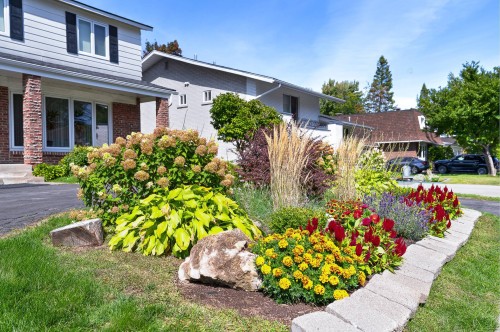 Façade - 12 Rue Lesage, Dollard-Des-Ormeaux, QC - Outdoor With Deck Patio Veranda