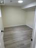 Unfurnished room with wood finished floors and baseboards - 59 Windrush Trail S Unit# B, Kitchener, ON  - Indoor Photo Showing Other Room 