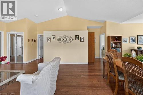 Dining space featuring dark wood-style flooring and vaulted ceiling - 48 Hallmark Trail, Hamilton, ON - Indoor