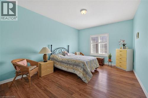 Bedroom featuring baseboards and hardwood / wood-style flooring - 48 Hallmark Trail, Hamilton, ON - Indoor Photo Showing Bedroom