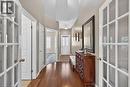 Foyer with dark wood-style flooring and french doors - 48 Hallmark Trail, Hamilton, ON  - Indoor Photo Showing Other Room 