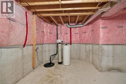 Unfinished below grade area with a water softener - 48 Hallmark Trail, Hamilton, ON - Indoor Photo Showing Basement