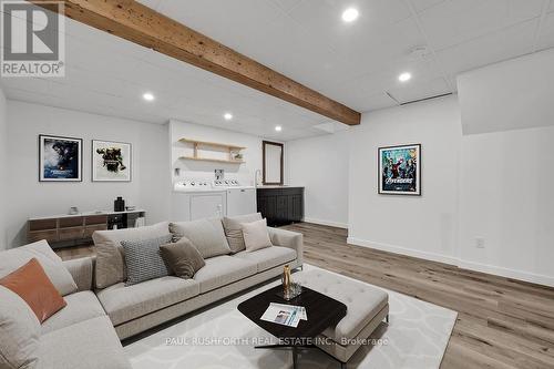 Virtually Staged-Basement Rec Room - 23 Pixley Private, Ottawa, ON - Indoor Photo Showing Living Room