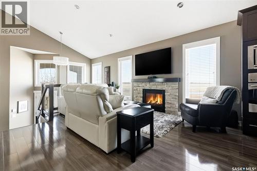 4127 Cumberland Road E, Regina, SK - Indoor Photo Showing Living Room With Fireplace