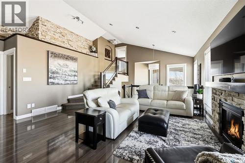 4127 Cumberland Road E, Regina, SK - Indoor Photo Showing Living Room With Fireplace