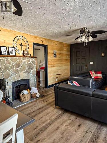 84 Cedar Lane, Joly, ON - Indoor Photo Showing Living Room With Fireplace