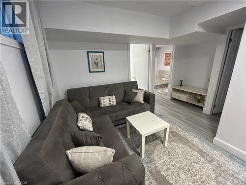 Living room featuring wood finished floors - 206A Springfield Crescent Unit# Lower, Waterloo, ON - Indoor Photo Showing Living Room