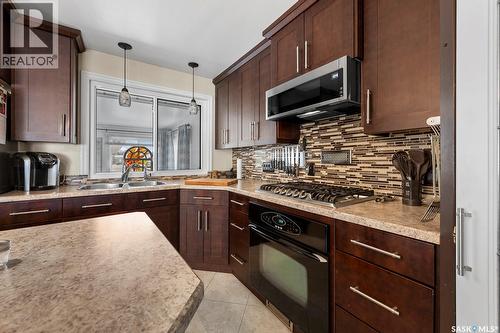 132 Mcnab Crescent, Regina, SK - Indoor Photo Showing Kitchen With Double Sink With Upgraded Kitchen