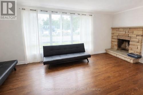 1152 Tawney Road, Ottawa, ON - Indoor Photo Showing Living Room With Fireplace