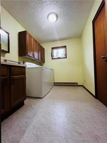 16 Veterans Avenue, Waskada, MB - Indoor Photo Showing Laundry Room