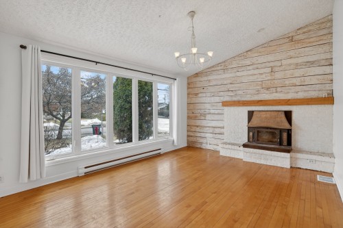 Salon - 580 6E Avenue, Saint-Jérôme, QC - Indoor Photo Showing Living Room With Fireplace