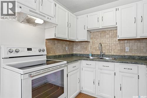 3860 7Th Avenue E, Regina, SK - Indoor Photo Showing Kitchen With Double Sink