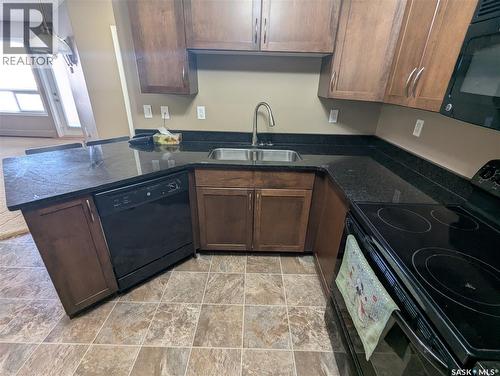 323 150 Pawlychenko Lane, Saskatoon, SK - Indoor Photo Showing Kitchen With Double Sink