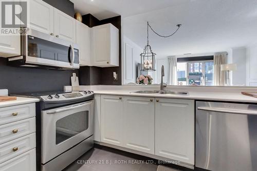 Lp915 - 18 Concorde Place, Toronto, ON - Indoor Photo Showing Kitchen With Double Sink