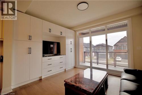 Living room with light wood-style flooring - 559 Balsam Poplar Street, Waterloo, ON - Indoor