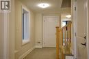 Foyer with a textured ceiling and light tile patterned flooring - 559 Balsam Poplar Street, Waterloo, ON  - Indoor Photo Showing Other Room 