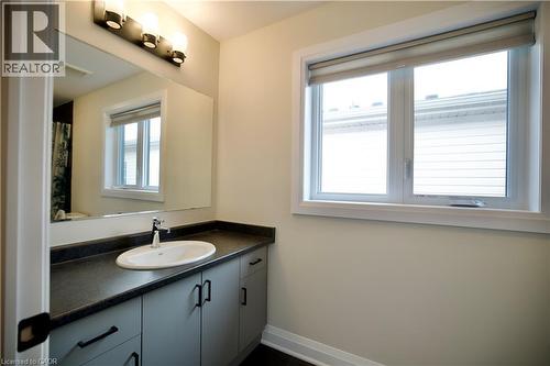 Bathroom with vanity and curtained shower - 559 Balsam Poplar Street, Waterloo, ON - Indoor Photo Showing Bathroom