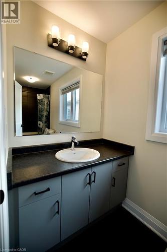 Bathroom featuring vanity and a shower with curtain - 559 Balsam Poplar Street, Waterloo, ON - Indoor Photo Showing Bathroom