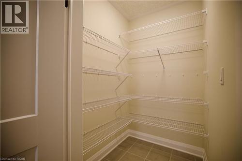 View of pantry - 559 Balsam Poplar Street, Waterloo, ON - Indoor With Storage