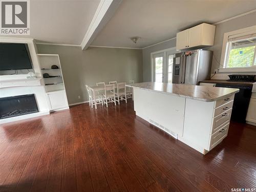 31 O'Connor Crescent, Kindersley, SK - Indoor Photo Showing Kitchen With Fireplace