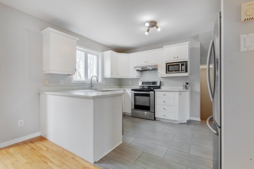 Cuisine - 19 Rue Roméo-Pilon, Blainville, QC - Indoor Photo Showing Kitchen With Upgraded Kitchen