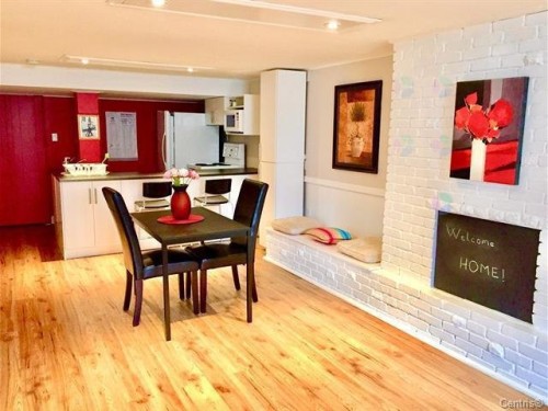 Salle familiale - 188 Av. Rowan, Beaconsfield, QC - Indoor Photo Showing Dining Room With Fireplace