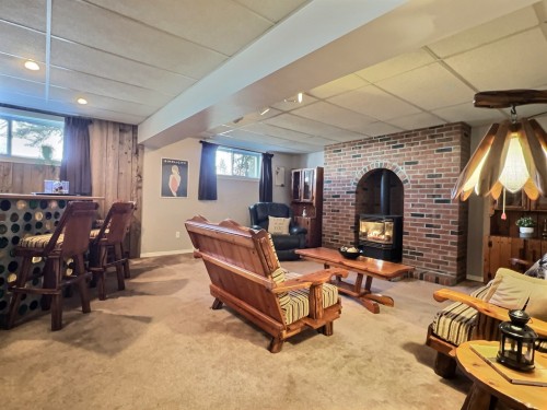 Family Room - 126 62E Avenue, Saint-Eustache, QC - Indoor With Fireplace