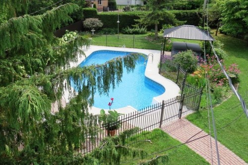 Courtyard - 126 62E Avenue, Saint-Eustache, QC - Outdoor With In Ground Pool With Backyard