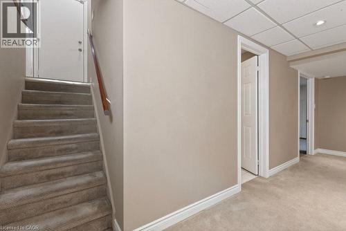 Side door entry plus inside garage entry access to basement - 39 Trenholme Crescent, Hamilton, ON - Indoor Photo Showing Other Room