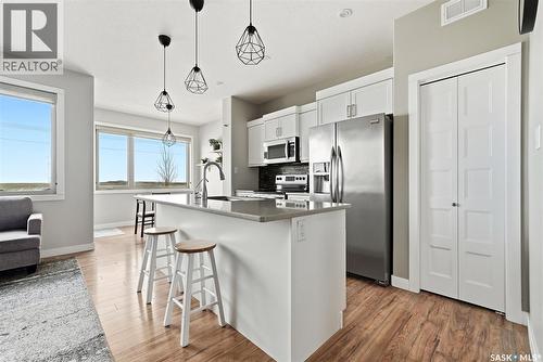 5668 Pearsall Crescent, Regina, SK - Indoor Photo Showing Kitchen With Stainless Steel Kitchen With Upgraded Kitchen