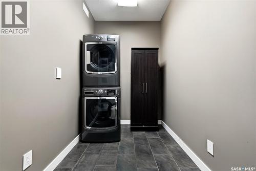 6040 Little Pine Loop, Regina, SK - Indoor Photo Showing Laundry Room