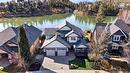 1894 Hidden Lake Place, Kelowna, BC  - Outdoor With Body Of Water With Facade 