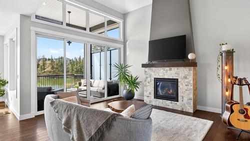 1894 Hidden Lake Place, Kelowna, BC - Indoor Photo Showing Living Room With Fireplace