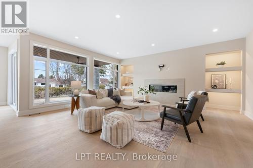 15 Briggs Avenue, Ottawa, ON - Indoor Photo Showing Living Room With Fireplace