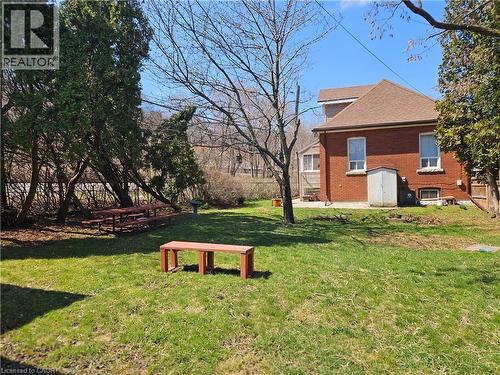 View of yard featuring a patio area - 253 Grosvenor Avenue S, Hamilton, ON - Outdoor