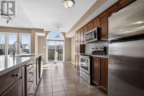Kitchen to Deck - 672 Pepperville Crescent E, Ottawa, ON - Indoor Photo Showing Kitchen With Upgraded Kitchen