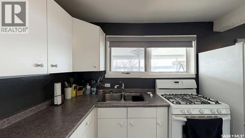 400 Hillcrest Avenue, Saskatchewan Beach, SK - Indoor Photo Showing Kitchen With Double Sink