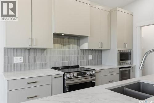 151 Nazarali Way, Saskatoon, SK - Indoor Photo Showing Kitchen With Upgraded Kitchen