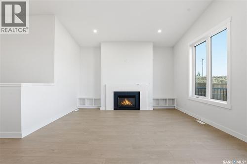 151 Nazarali Way, Saskatoon, SK - Indoor With Fireplace
