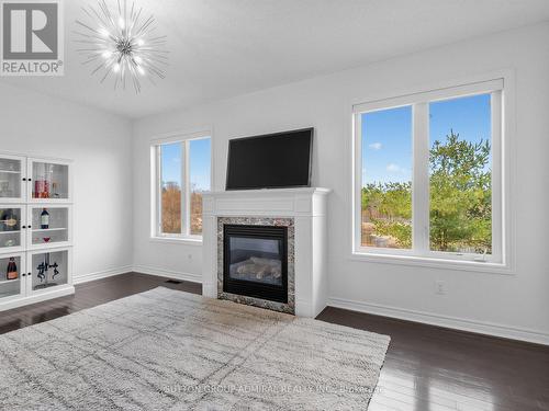 96 Mount Crescent, Essa, ON - Indoor Photo Showing Living Room With Fireplace