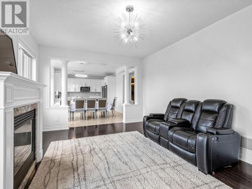 96 Mount Crescent, Essa, ON - Indoor Photo Showing Living Room With Fireplace