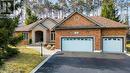 6 Lloyd Cook Drive E, Springwater, ON  - Outdoor With Facade 