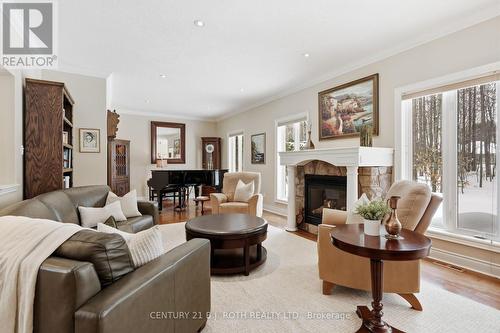 6 Lloyd Cook Drive E, Springwater, ON - Indoor Photo Showing Living Room With Fireplace