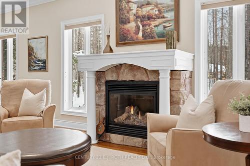6 Lloyd Cook Drive E, Springwater, ON - Indoor Photo Showing Living Room With Fireplace