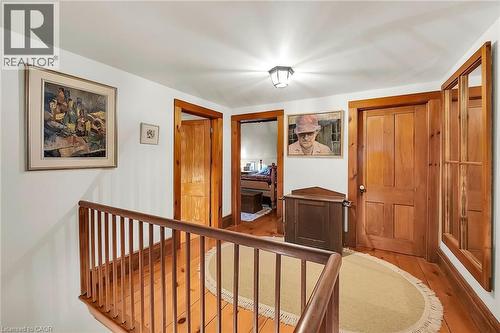Hallway featuring wood finished floors and an upstairs landing - 2432 Seburn Road, Fonthill, ON - Indoor Photo Showing Other Room