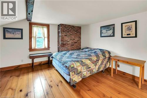 Bedroom with wood-type flooring and beam ceiling - 2432 Seburn Road, Fonthill, ON - Indoor Photo Showing Bedroom