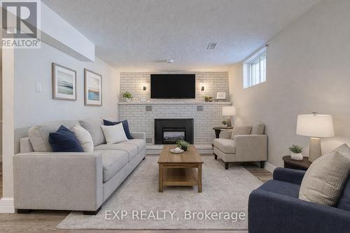 4 Colgate Court, Hamilton, ON - Indoor Photo Showing Living Room With Fireplace