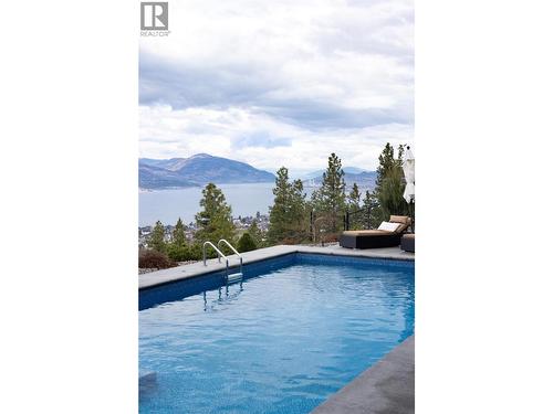 5650 The Edge Place Unit# 111, Kelowna, BC - Outdoor With In Ground Pool