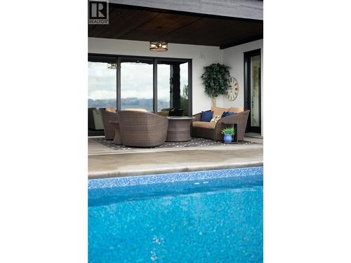 5650 The Edge Place Unit# 111, Kelowna, BC -  With In Ground Pool