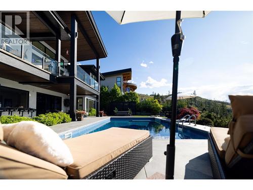 5650 The Edge Place Unit# 111, Kelowna, BC - Outdoor With In Ground Pool